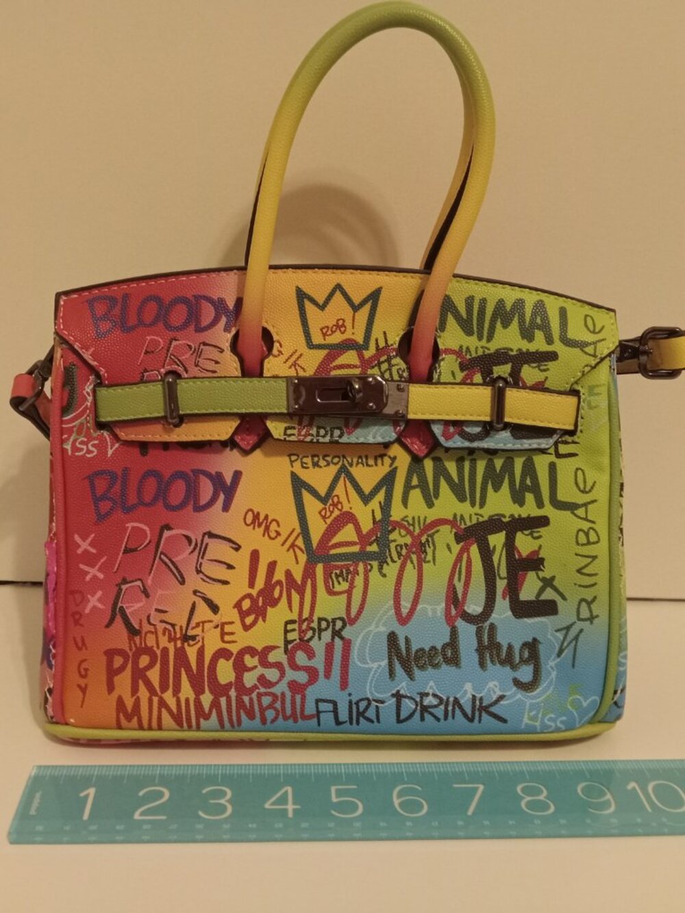 Birkin-inspired handbag in neon graffiti pattern